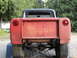 1966 International Scout 800 - Rear view of a 1966 International Scout 800 pickup truck, showing the tailgate and rear axle.