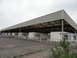 2003 Mercury Marauder - This scene depicts an abandoned border crossing facility with numerous booths covered by a large, industrial-style roof structure.