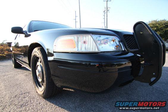 Black 2004 Ford Crown Victoria Police Interceptor with push bumper, front view