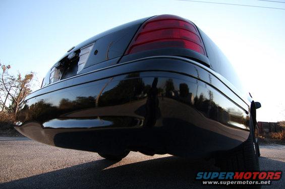 Rear view of a black 2004 Ford Crown Victoria