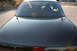 2004 Ford Crown Victoria - Black 2004 Ford Crown Victoria rear view showing antennas and rear window.