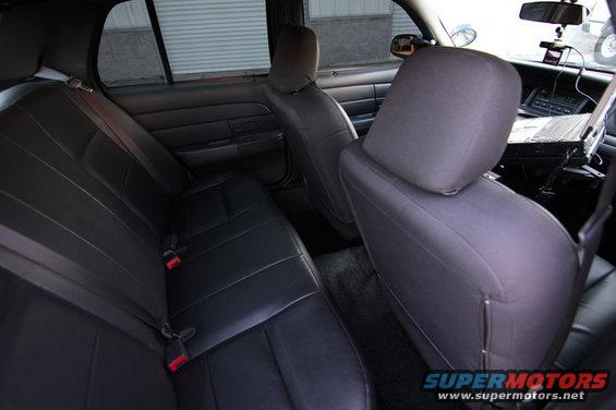 Interior view of a 2004 Ford Crown Victoria showing rear seats and dashboard