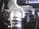 2003 Ford Crown Victoria - Close-up of engine components, including a Roush intake and a Kenne Bell supercharger sticker.