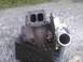 2003 Ford Crown Victoria - Pair of turbochargers shown on a crate outdoors.