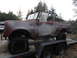 1961 International Scout 80 - This 1961 International Scout is seen on a trailer, displaying significant wear and tear.