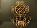 1989 Ford Bronco - A copper wire sculpture resembling a vintage diving helmet is displayed against a dark background.