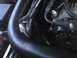 2003 Ford Crown Victoria - Close-up view of engine bay components including a hose and alternator.