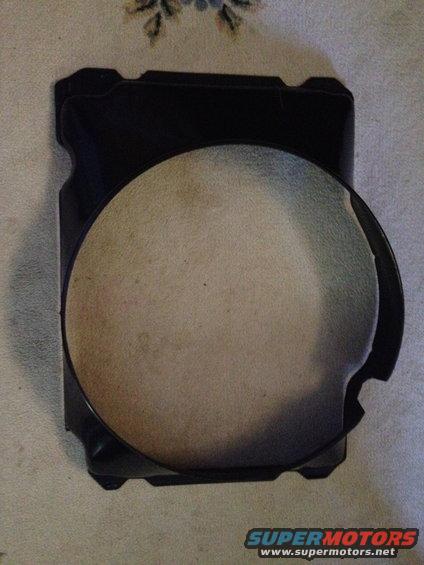 Black plastic part with circular textured insert