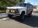 1986 Ford Bronco - Ford Bronco from the 1980s, equipped with four smiley face fog lights.
