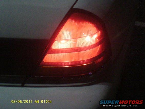 Close-up of a red taillight assembly on a vehicle