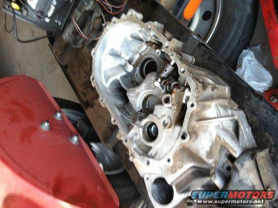 Disassembled transmission housing with internal components visible