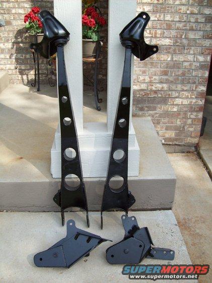 Black suspension lift components, including control arms and brackets
