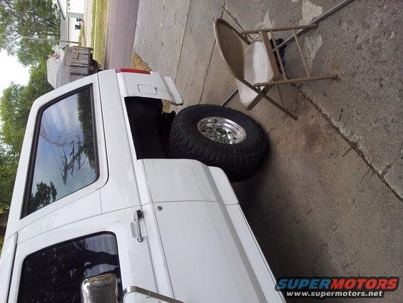 1996 Ford Bronco rear view with spare tire in cargo area