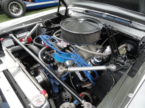 Engine bay with chrome air cleaner and blue spark plug wires