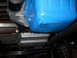 1992 Ford Bronco - Close-up view of a blue engine oil pan with visible fins and a bolt.