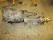 1971 Ford Ranchero - An automatic transmission assembly is shown on a concrete floor, possibly for repair or sale.