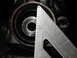 1971 Ford Ranchero - Measuring a component with a ruler. The part has some markings on its outer edge.