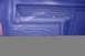 1982 Ford Bronco - The interior door panel shows a textured blue fabric design.