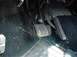1991 Ford Crown Victoria - Close-up of the brake and accelerator pedals in a vehicle's footwell.