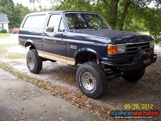 1990 Ford Bronco lifted with off-road tires and winch bumper
