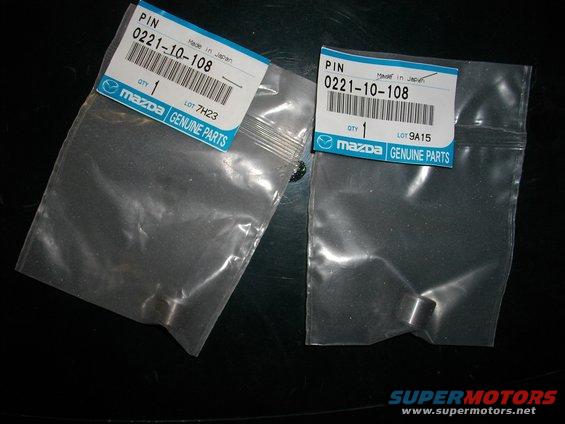 Two plastic bags containing Mazda genuine parts pins, part number 0221-10-108