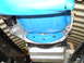 1992 Ford Bronco - Underside view of a vehicle's transmission bell housing, a bright blue protective cover.
