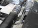 1992 Ford Bronco - Close-up view of the driveshaft and suspension components of a vehicle.