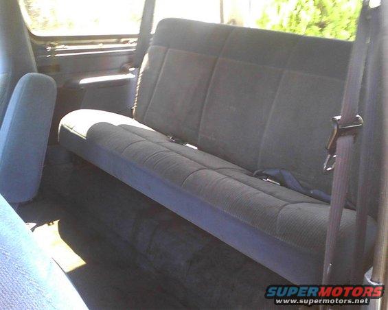 1996 Ford Bronco interior showing rear bench seat and seatbelt