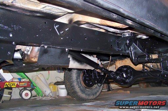 1978 Ford Bronco undercarriage with black frame, leaf springs, and differential