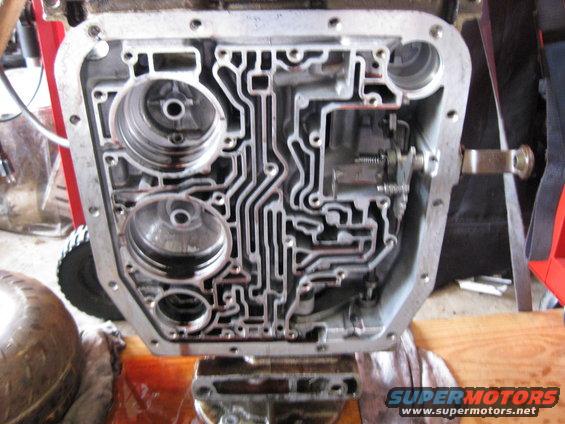 img_0539.jpg Overdrive servo, Low / Reverse servo, and 2-3 Accumulator removed. Valve body gasket also removed.