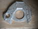 1992 Ford Bronco - This machined aluminum adapter plate features intricate grooving and multiple mounting points.