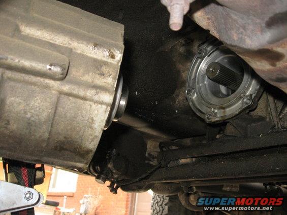 Disconnected the transfer case from the transmission.  First time I've ever taken it off, and the first big step into a big project.

Easy enough to remove, just six bolts.