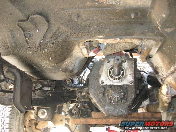 Underside view of vehicle showing transmission and drivetrain components