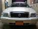 2008 Mercury Grand Marquis - Front view of a silver 2008 Mercury Grand Marquis parked indoors.
