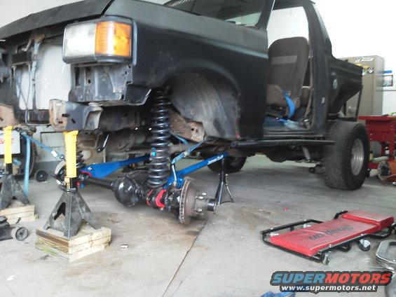 1989 Ford Bronco front end removed, lifted on jack stands