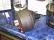 1991 Ford Crown Victoria - A brake booster part sits on a blue speckled counter, with kitchen appliances in the background.