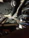 1996 Ford F-150 - Detail of a vehicle's suspension system, showing a coil spring and rusty metal components.