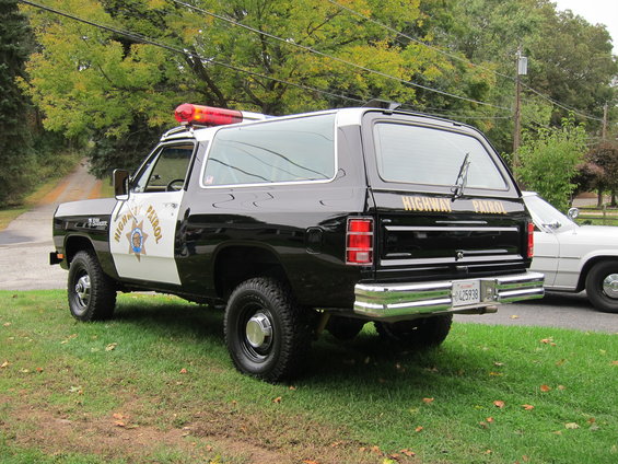 Black and white Dodge Ramcharger with "Highway Patrol" text and light bar