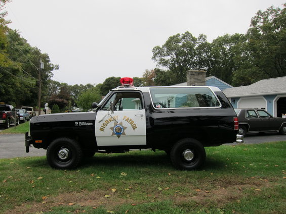 1987 Dodge Ramcharger SUV in highway patrol livery, side view