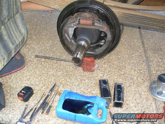The lack of oil on the brake mechanisms tells me it hasn't been leaking long.  There's just a light film on the shoes, and the outer part of the backing plate.