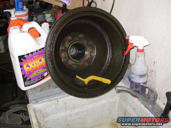 PurplePower & a little elbow grease will take off everything that shouldn't be there.  The scalding hot water will make sure any residue washes away, and help to dry the surfaces.