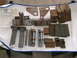 1971 Ford Ranchero - Various metal components, including brackets and bolts, are arranged on a white cloth next to installation instructions.