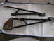 1971 Ford Ranchero - Aftermarket control arms shown laid out on a white cloth.