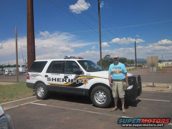 White Coconino County Sheriff's SUV parked, side view