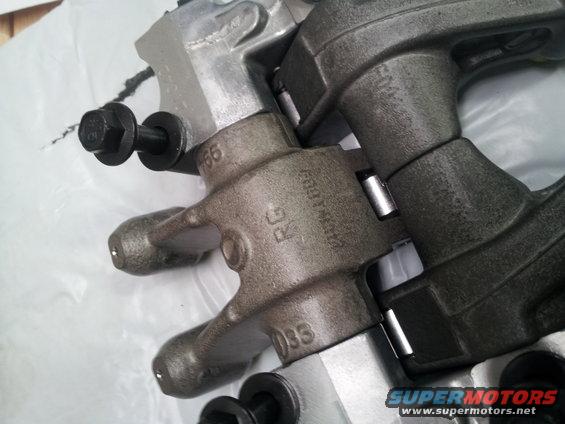 Close-up of engine valve train components with visible markings