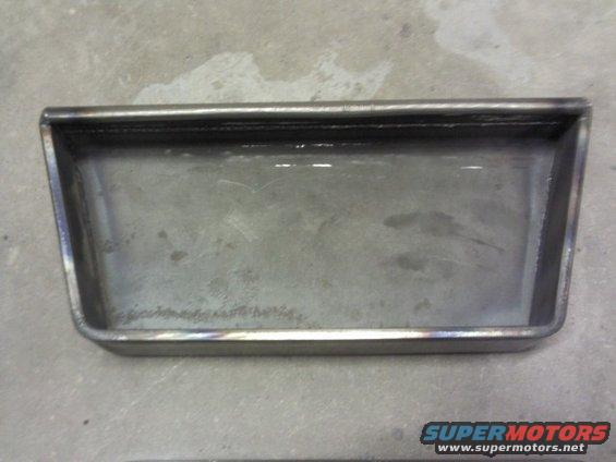 Metal tray with welded seams, viewed from above