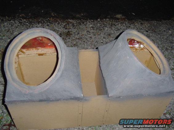 Custom dual-chamber speaker box with two large circular openings