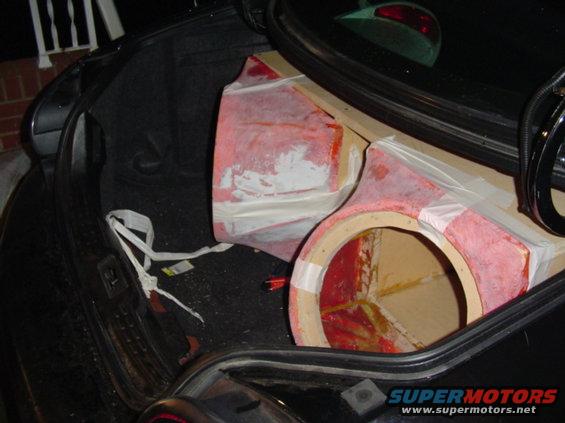 Custom speaker box in trunk, red and wood construction