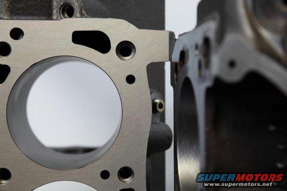 Engine block and gasket with circular openings, close-up view