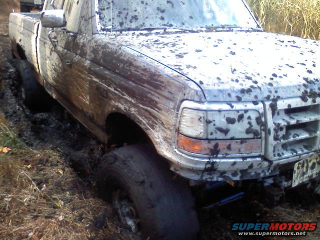 sitting on the axles, didnt really try to hard to get myself out because the ground was real soft and I was sinking easy, so hooked it up to my buddies truck